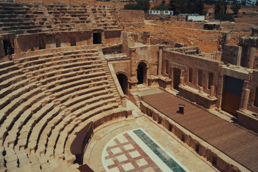 an ancient coliseum with many people